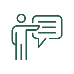Icon of a person standing and pointing to a speech bubble signifying interpretation services